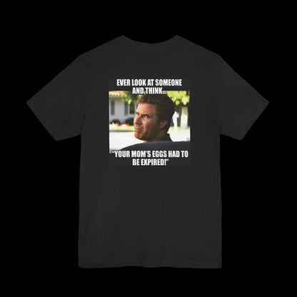 a man with a serious expression, and there is a humorous caption below the image that reads, "Your mom's eggs had to be expired!"