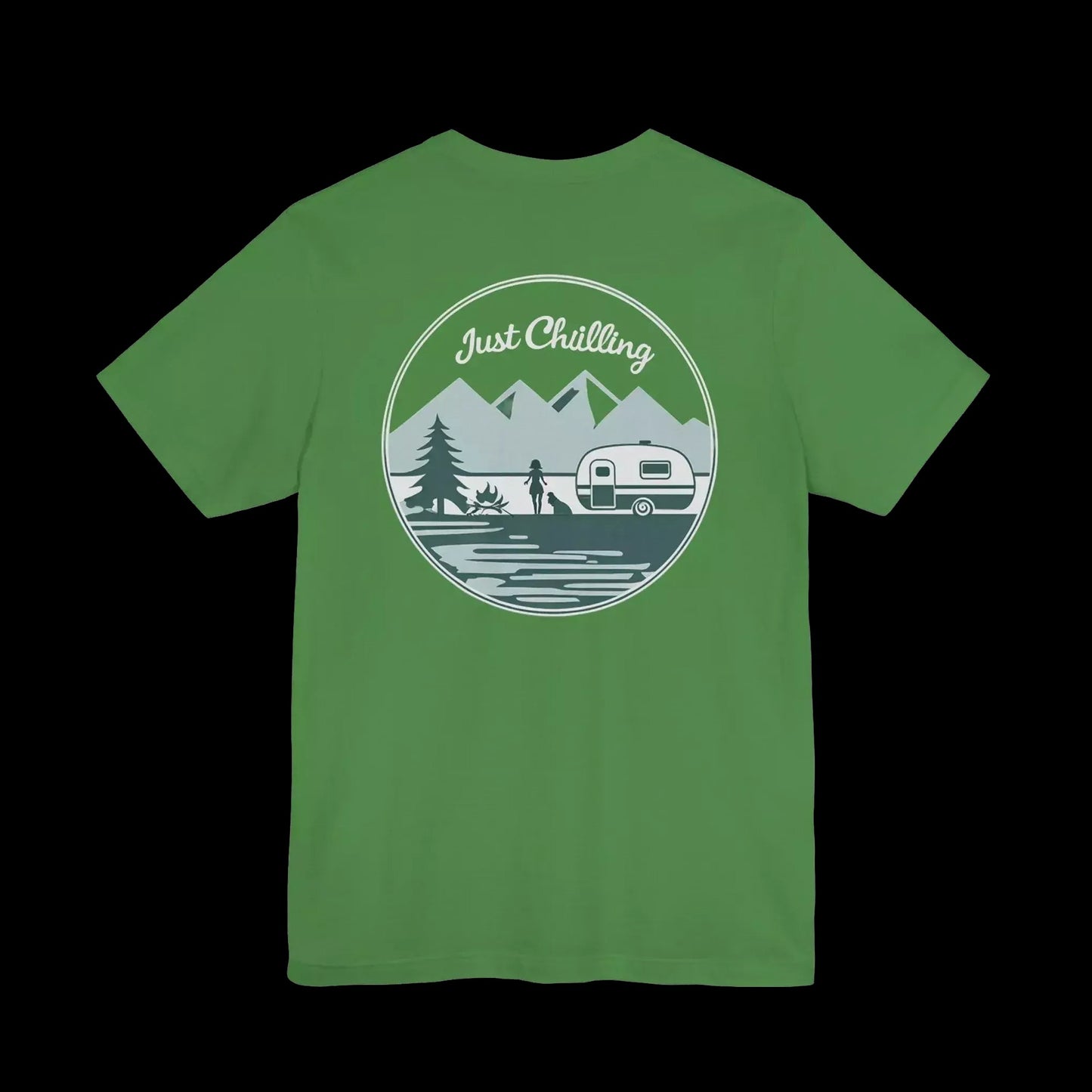 A green t-shirt with a circular graphic design featuring a mountain landscape, a camper van, and the text "Just Challenging".