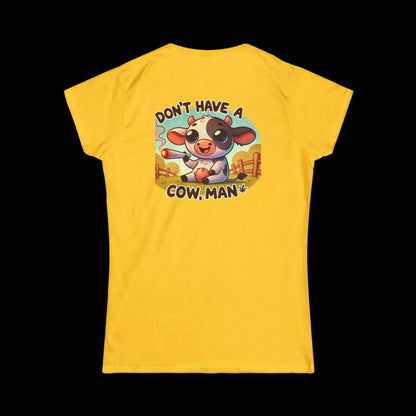 A yellow t-shirt with a cartoon cow and the text "Don't have a cow man" printed on it.