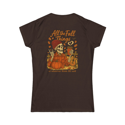 A t-shirt design featuring a skeleton wearing a red hat and holding a cup, surrounded by autumn-themed elements such as pumpkins and leaves.