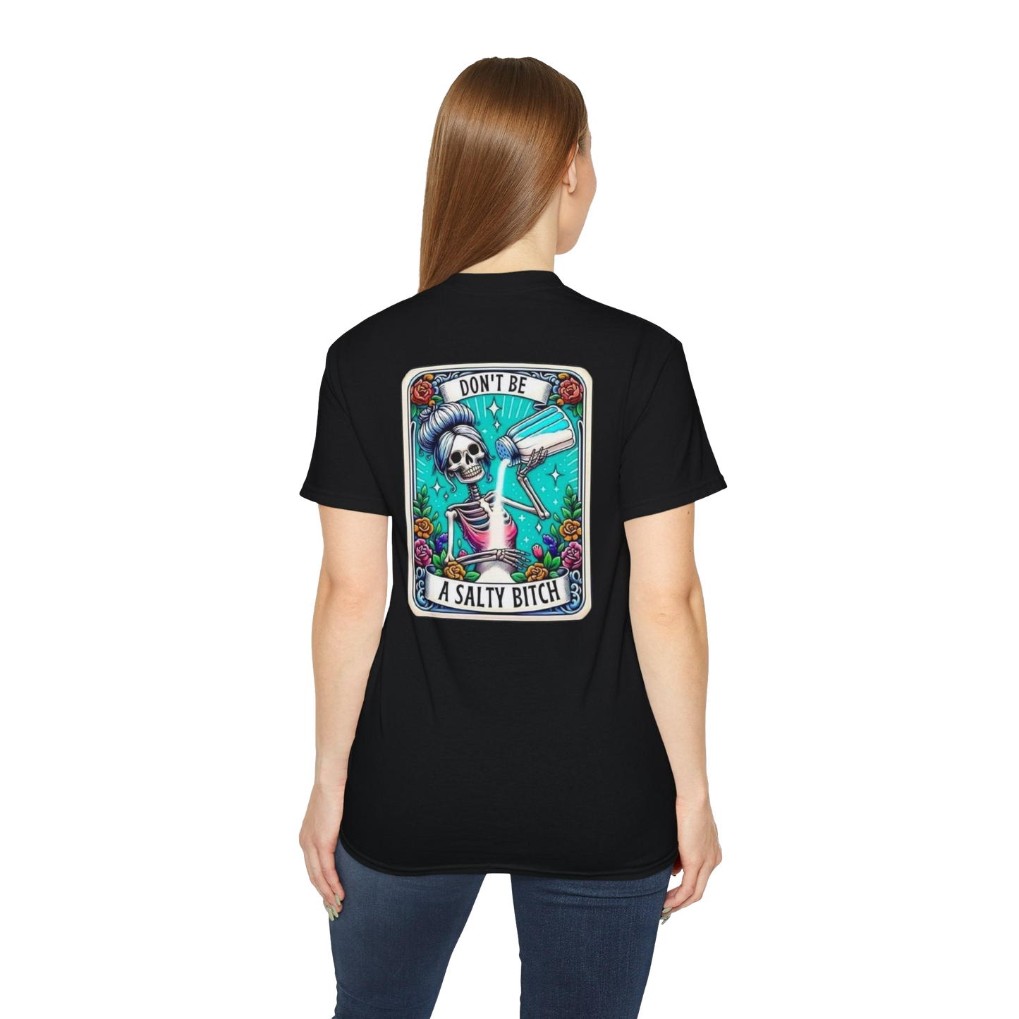 A woman wearing a black t-shirt with a graphic design on the back.