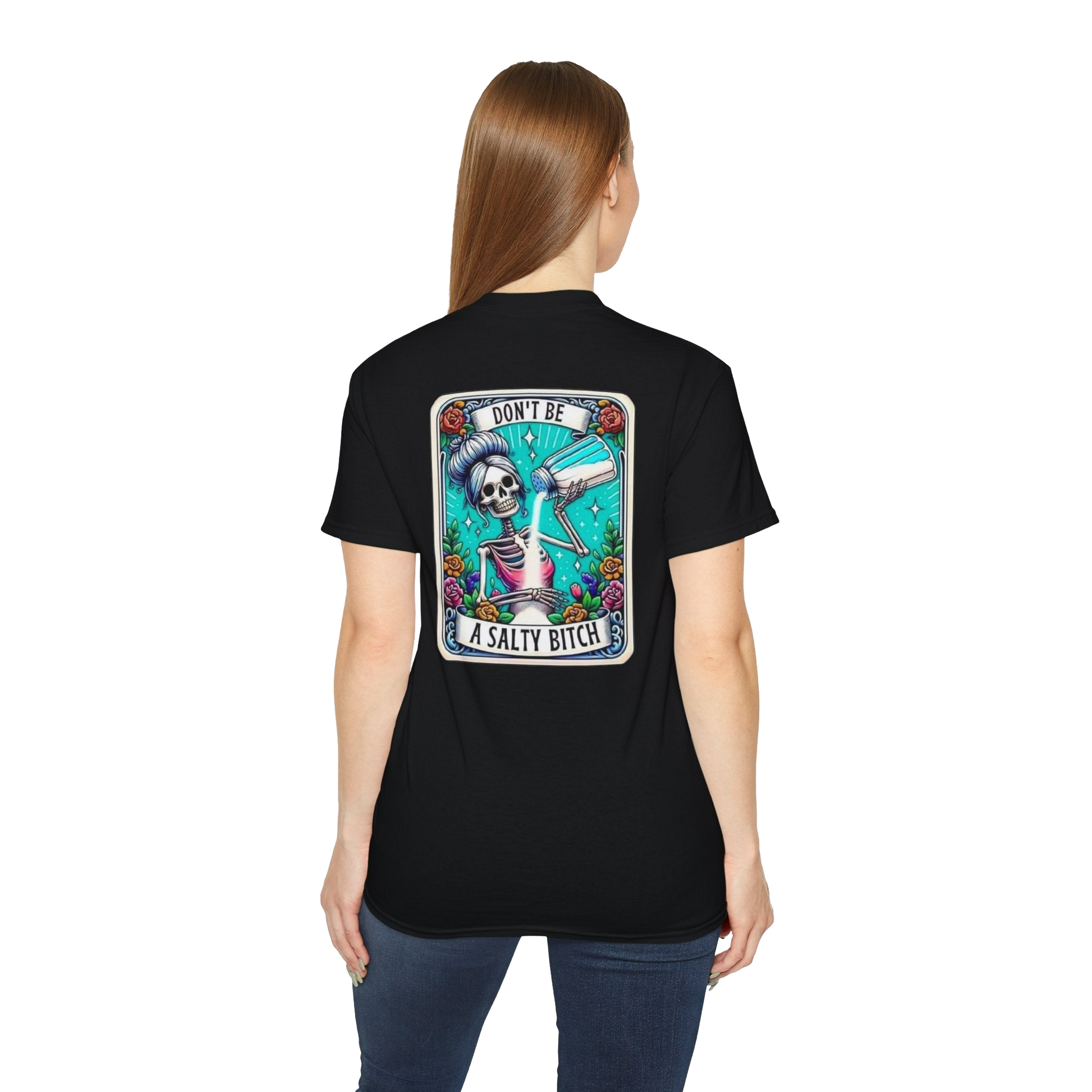 A woman wearing a black t-shirt with a graphic design on the back.