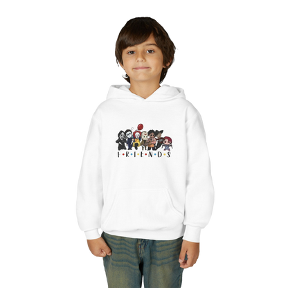 A young boy wearing a white hoodie with a graphic of cartoon characters from the TV show Friends.