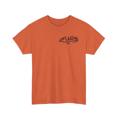 The image is a single orange t-shirt with the text "JUSTchilling INC." printed on it.