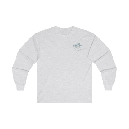 A white long-sleeved shirt with a logo on the left side.