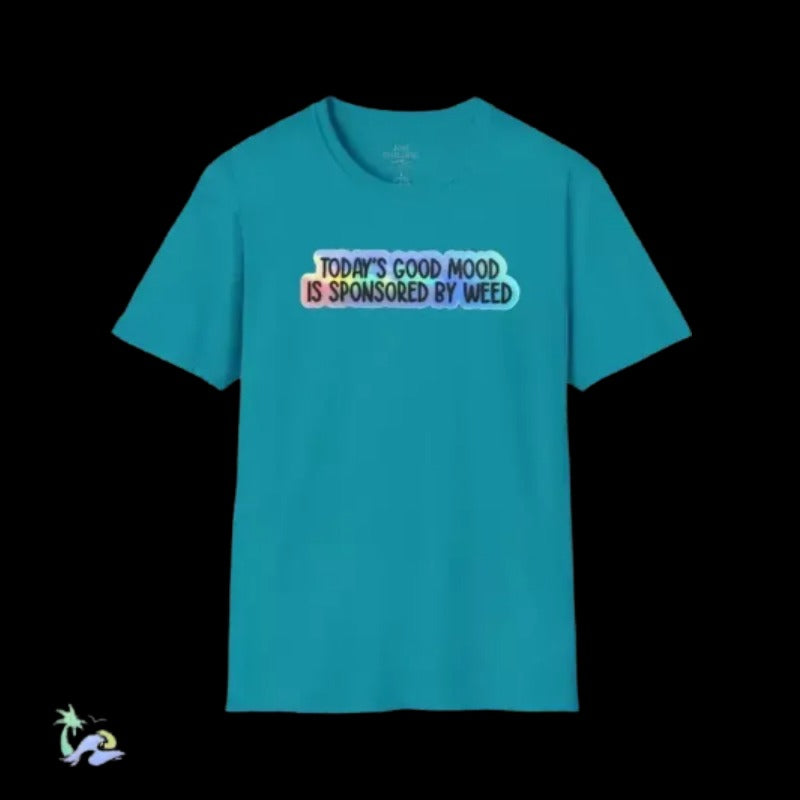 A teal-colored t-shirt with text printed on it.