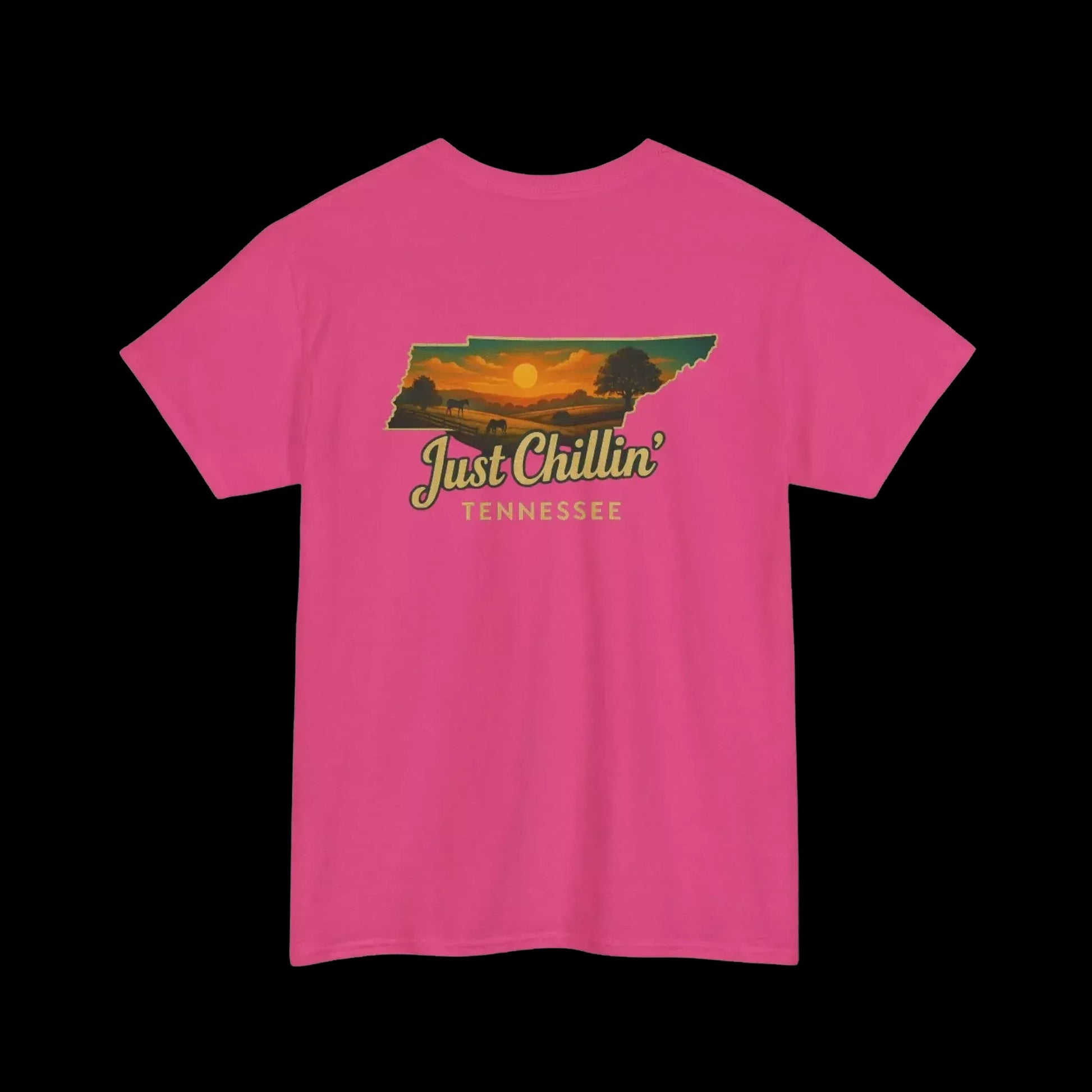 A pink t-shirt with a graphic design depicting a sunset over the state of Tennessee.
