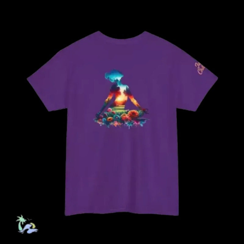 A purple t-shirt with a colorful graphic design depicting a person sitting in a meditative pose surrounded by flowers and a sunset-like background.