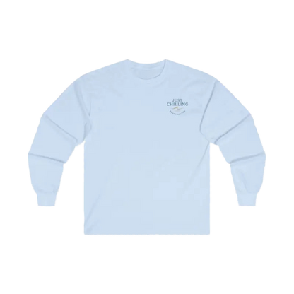 A white long-sleeved shirt with a small logo on the left side of the chest.
