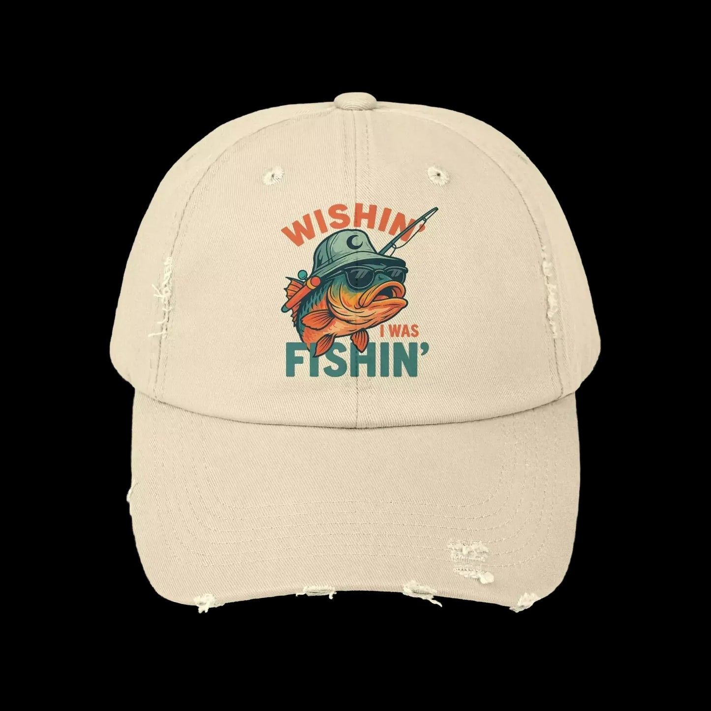 A beige baseball cap with a graphic design featuring a fish wearing a helmet and the text "Wishin' I was fishin'".
