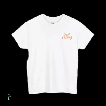 A white t-shirt with the text "Just Chilling" printed on the left side.