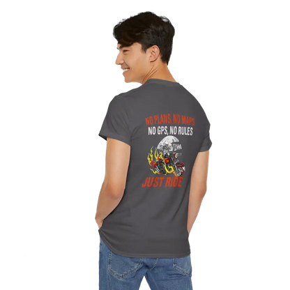 A young man wearing a grey t-shirt with a graphic design and text on the back.