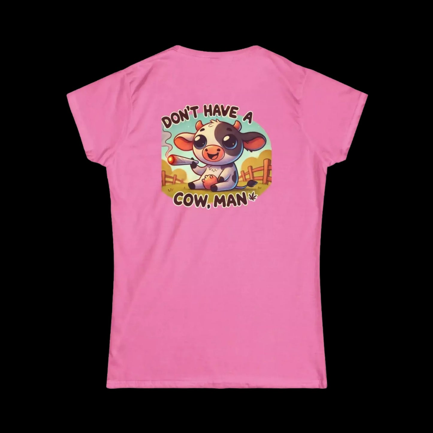 A pink t-shirt with a cartoon cow and the text "DON'T HAVE A COW MAN" printed on it.