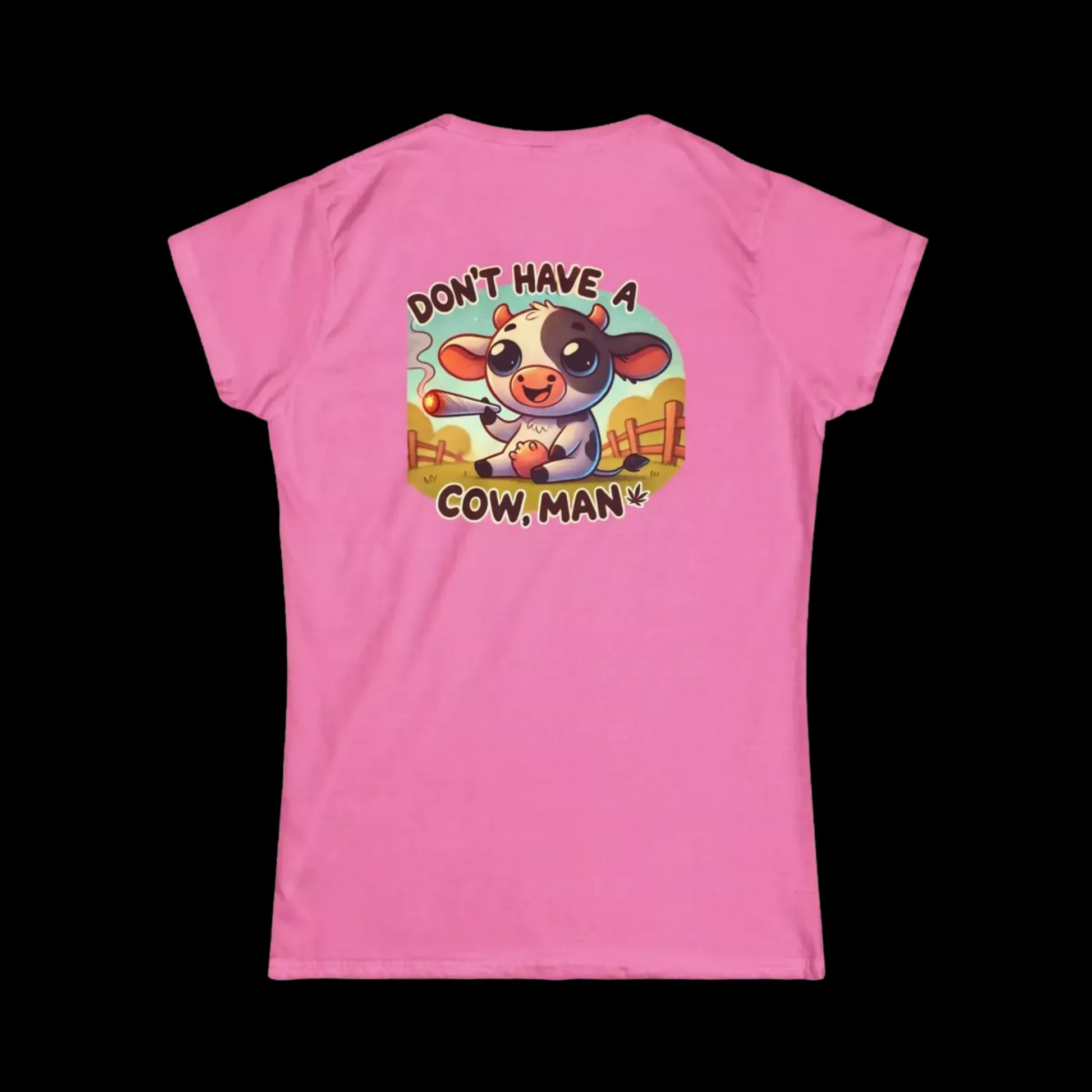 A pink t-shirt with a cartoon cow and the text "DON'T HAVE A COW MAN" printed on it.