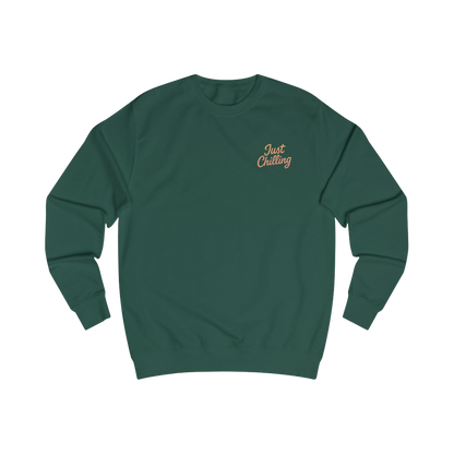 A green long-sleeved sweater with a small embroidered logo on the left side.