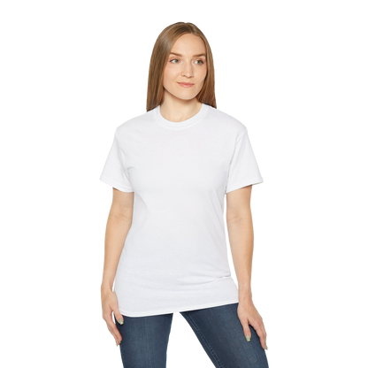 A woman wearing a white t-shirt and blue jeans stands against a black background.