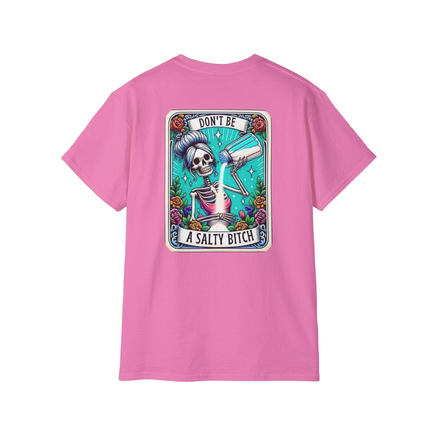 A pink t-shirt with a graphic design featuring a skeleton holding a salt shaker and the text "DON'T BE A SALTY BITCH" against a colorful background.