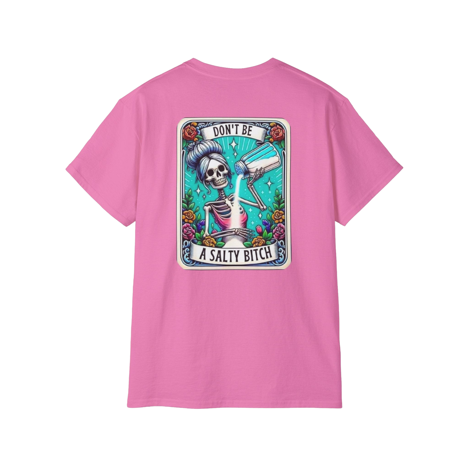 A pink t-shirt with a graphic design featuring a skeleton holding a salt shaker and the text "DON'T BE A SALTY BITCH" against a colorful background.