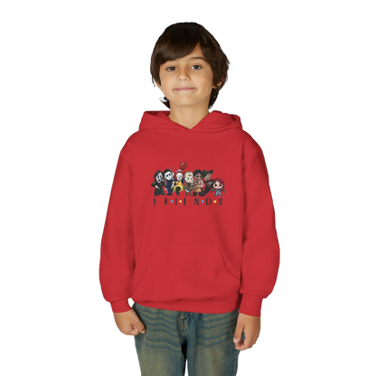 A young boy wearing a red hoodie with a graphic of cartoon characters on it.