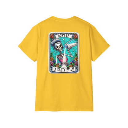 A yellow t-shirt with a graphic design featuring a skeleton wearing a sombrero and holding a sign that says "DON'T BE A SALTY BITCH".