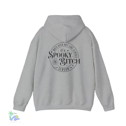 A grey hooded sweatshirt with a circular design on the back featuring the text "It's Spooky Bitch Season" printed on it.