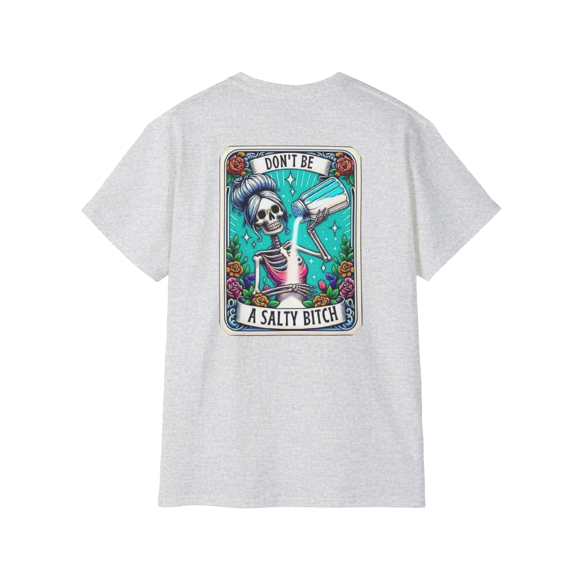 A white t-shirt with a graphic design featuring a skeleton wearing a sombrero and holding a bottle of alcohol, surrounded by colorful flowers and plants.