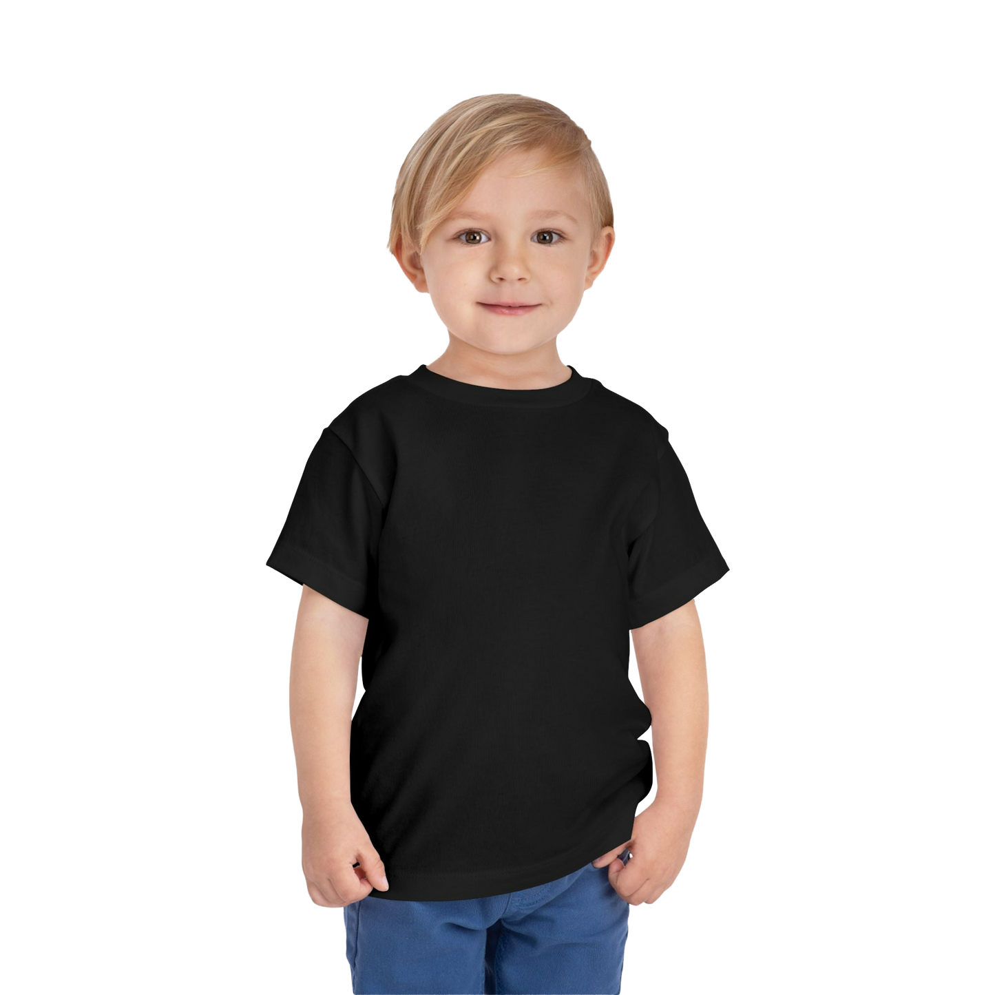 A young boy with blonde hair is smiling and standing against a black background.