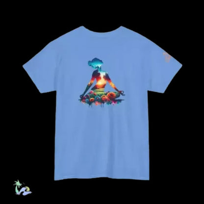 A blue t-shirt with a colorful graphic design depicting a person in a meditative pose surrounded by flowers and a sunset.