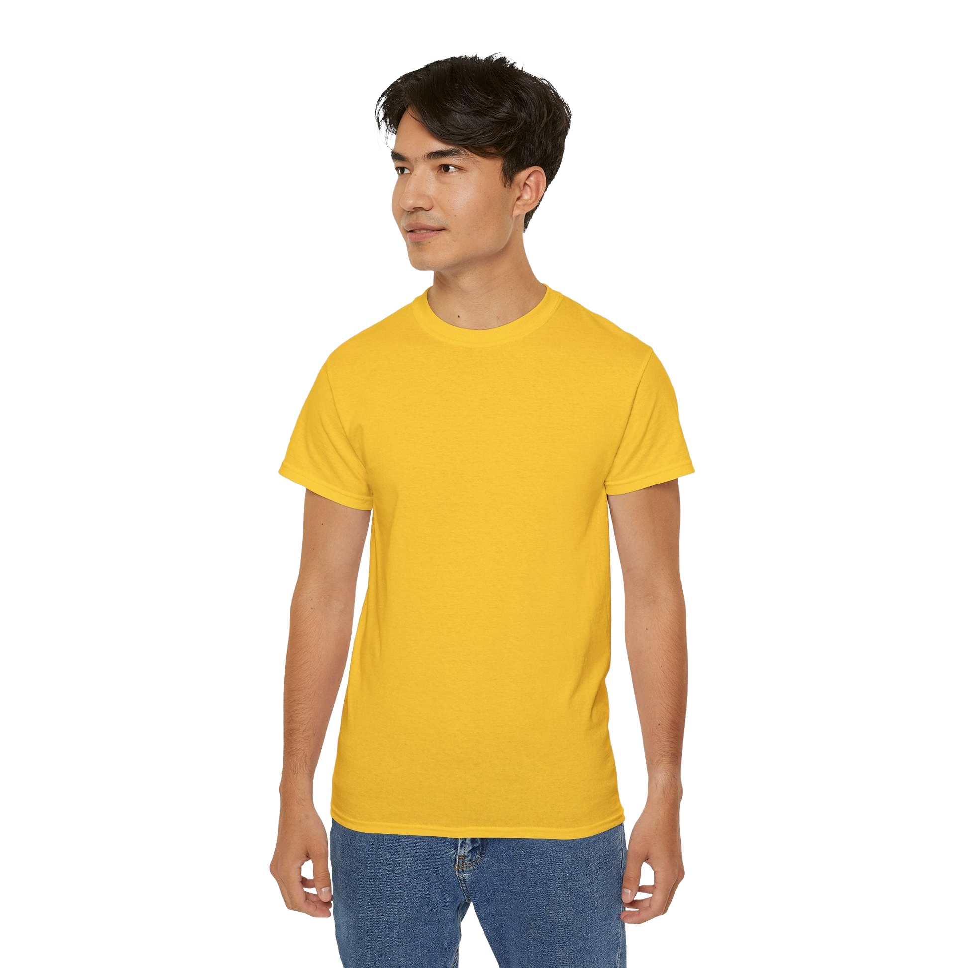 A young man wearing a yellow t-shirt and blue jeans stands against a black background.