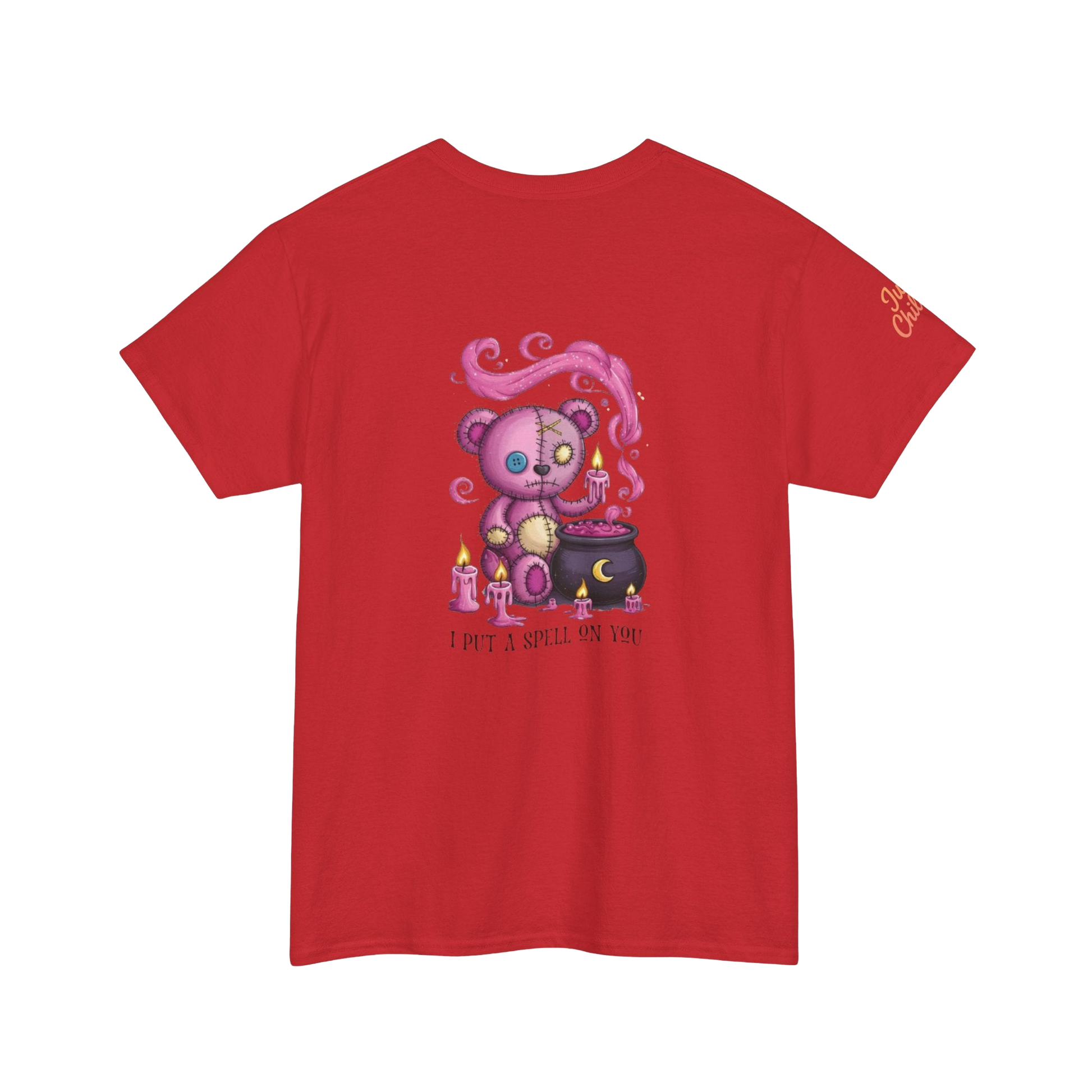 A red t-shirt with a graphic design depicting a pink teddy bear surrounded by candles and a cauldron, with the text "I PUT SPELLING ON YOU" below the image.