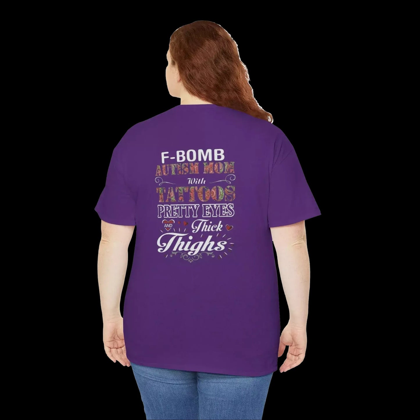 A person wearing a purple t-shirt with text on the back.