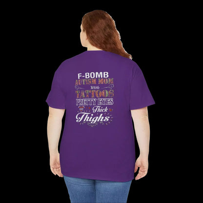 A person wearing a purple t-shirt with text on the back.