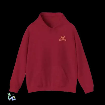 A red hoodie with the text "Just Chilling" printed on it.
