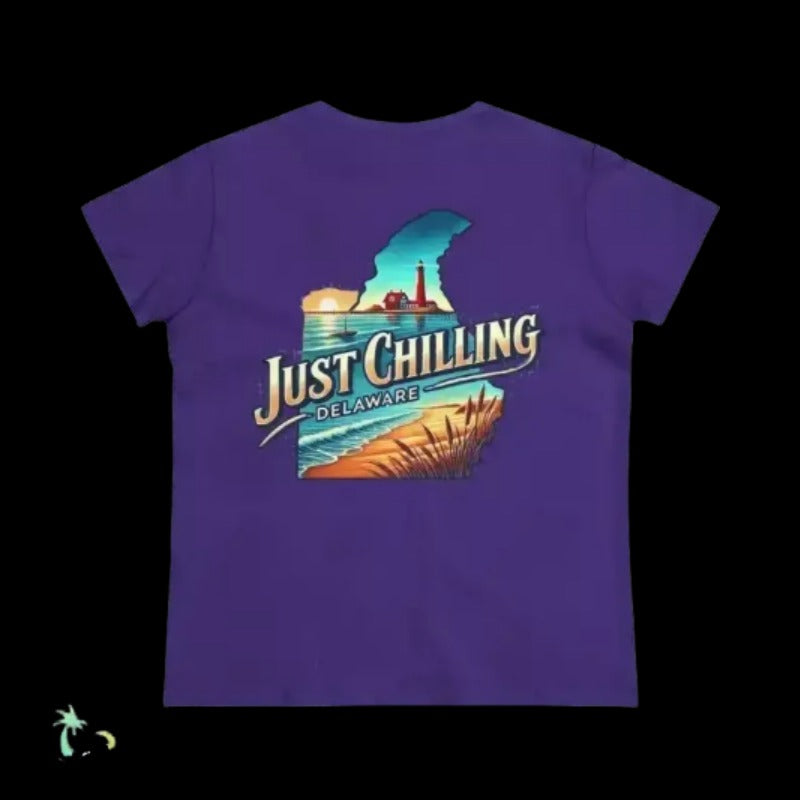 A purple t-shirt with a graphic design depicting a beach scene and the text "Just Chilling Delaware" printed on it.