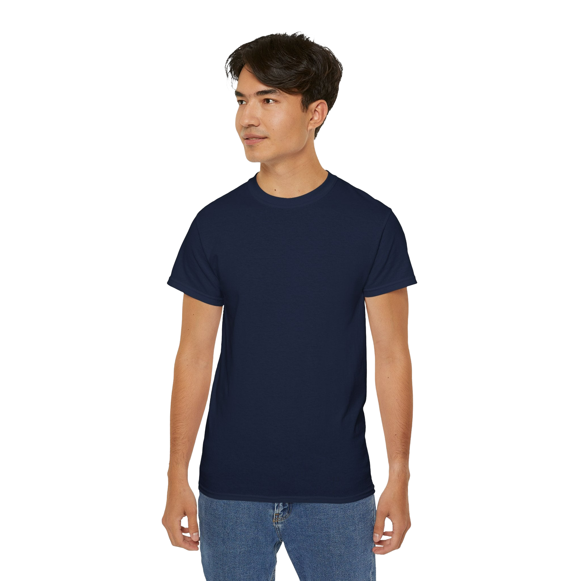 A young man wearing a navy blue t-shirt and blue jeans stands against a black background.