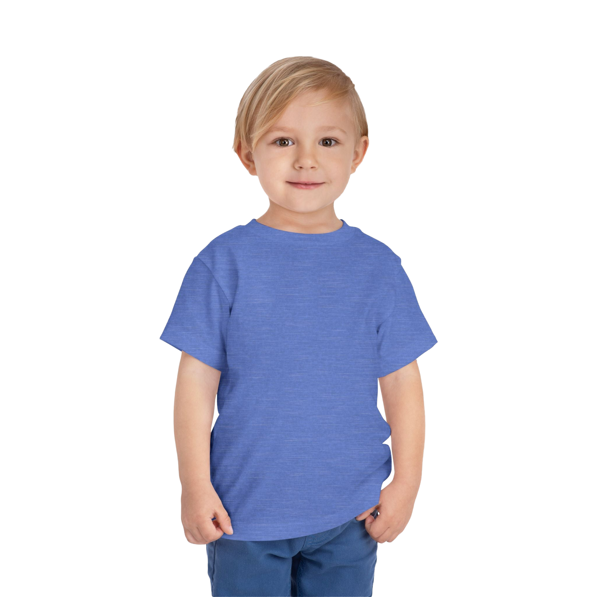 A young boy with blonde hair is smiling and wearing a blue t-shirt.