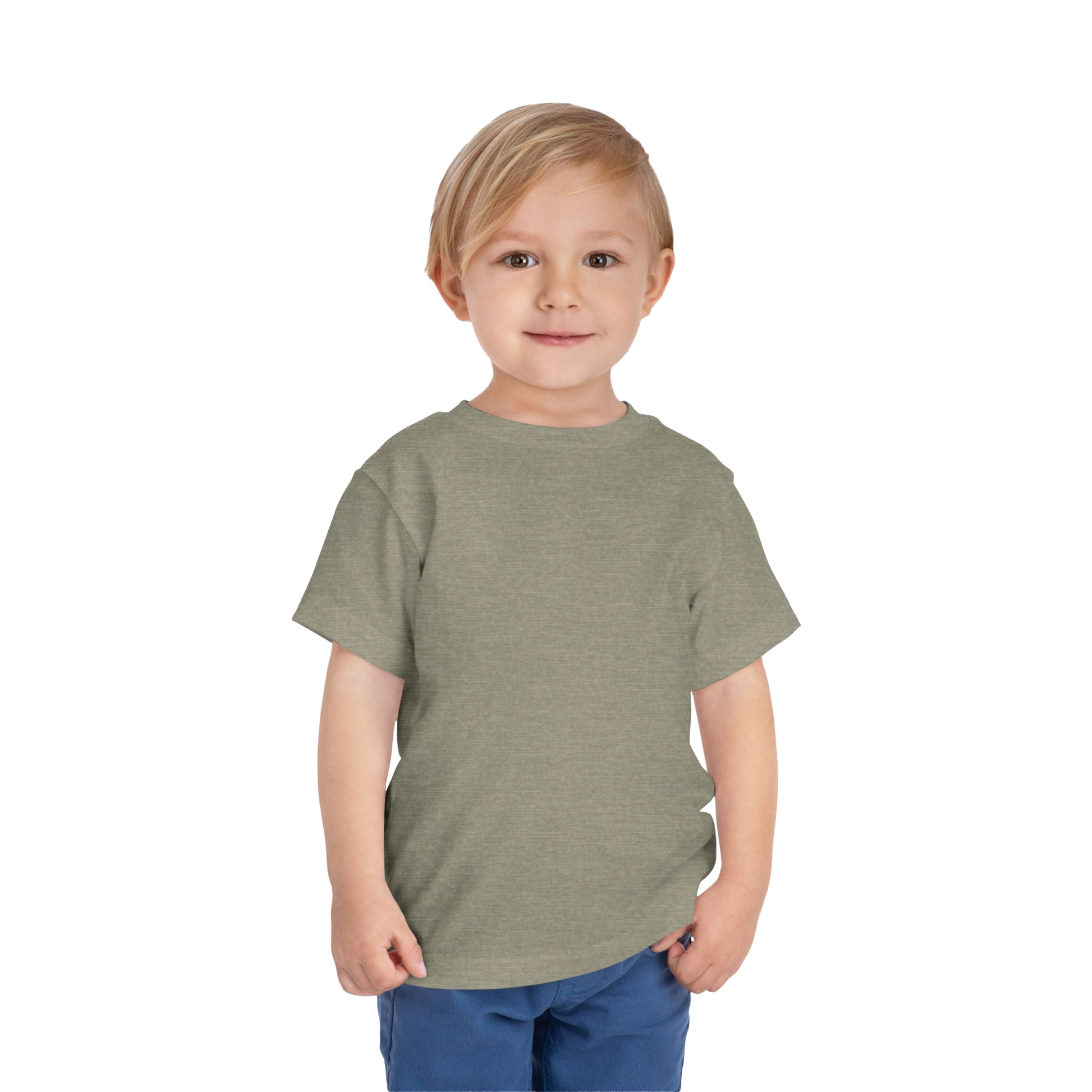 A young boy with blonde hair is smiling and standing against a black background.