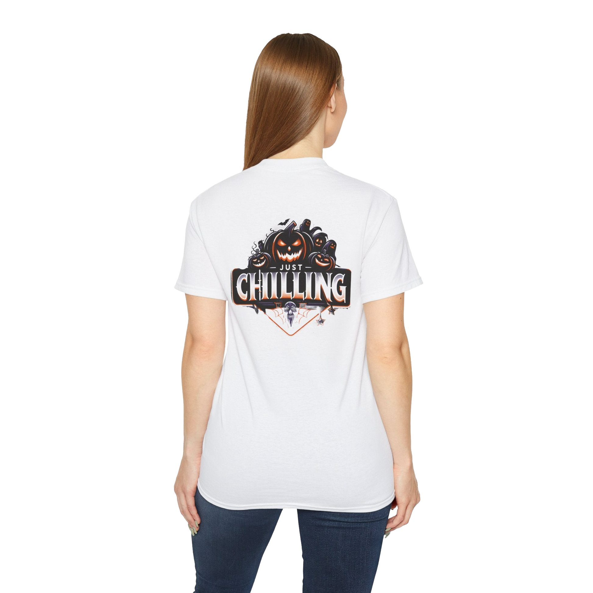 A woman wearing a white t-shirt with a graphic design on the back.
