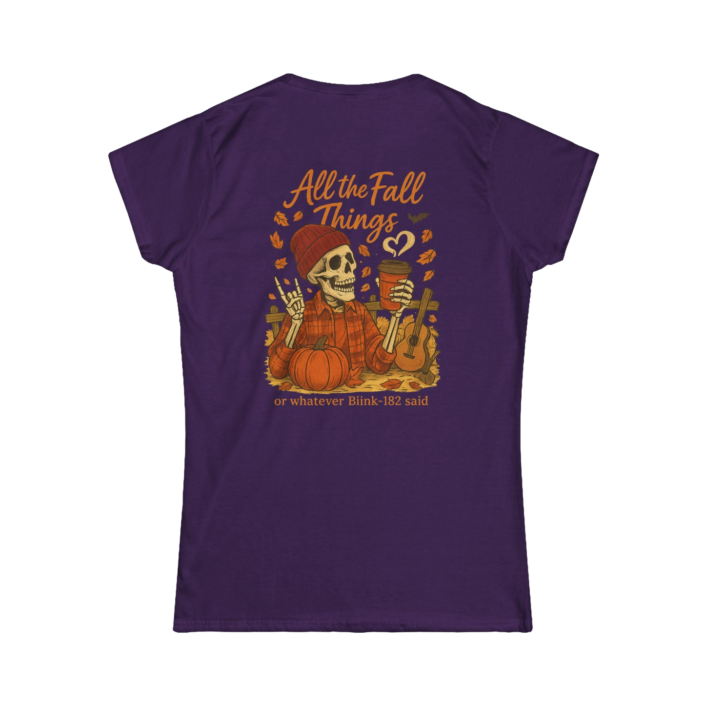 A purple t-shirt with an illustration of a skeleton holding a cup and a pumpkin, surrounded by autumn leaves and a heart. The text on the back of the t-shirt says "All the Fall Things or whatever Blik 182 said".