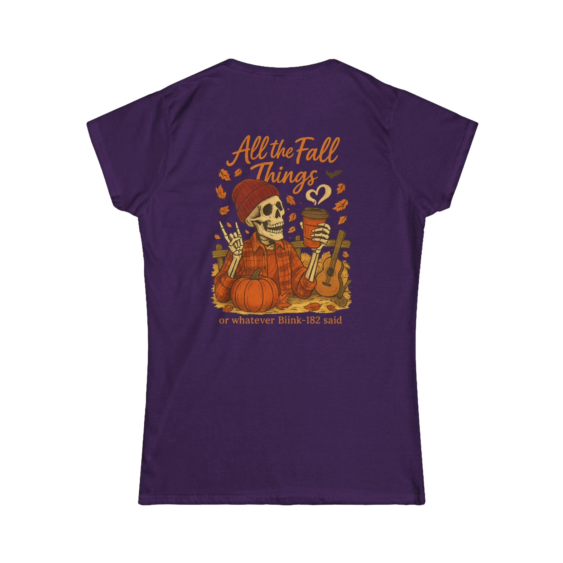 A purple t-shirt with an illustration of a skeleton holding a cup and a pumpkin, surrounded by autumn leaves and a heart. The text on the back of the t-shirt says "All the Fall Things or whatever Blik 182 said".