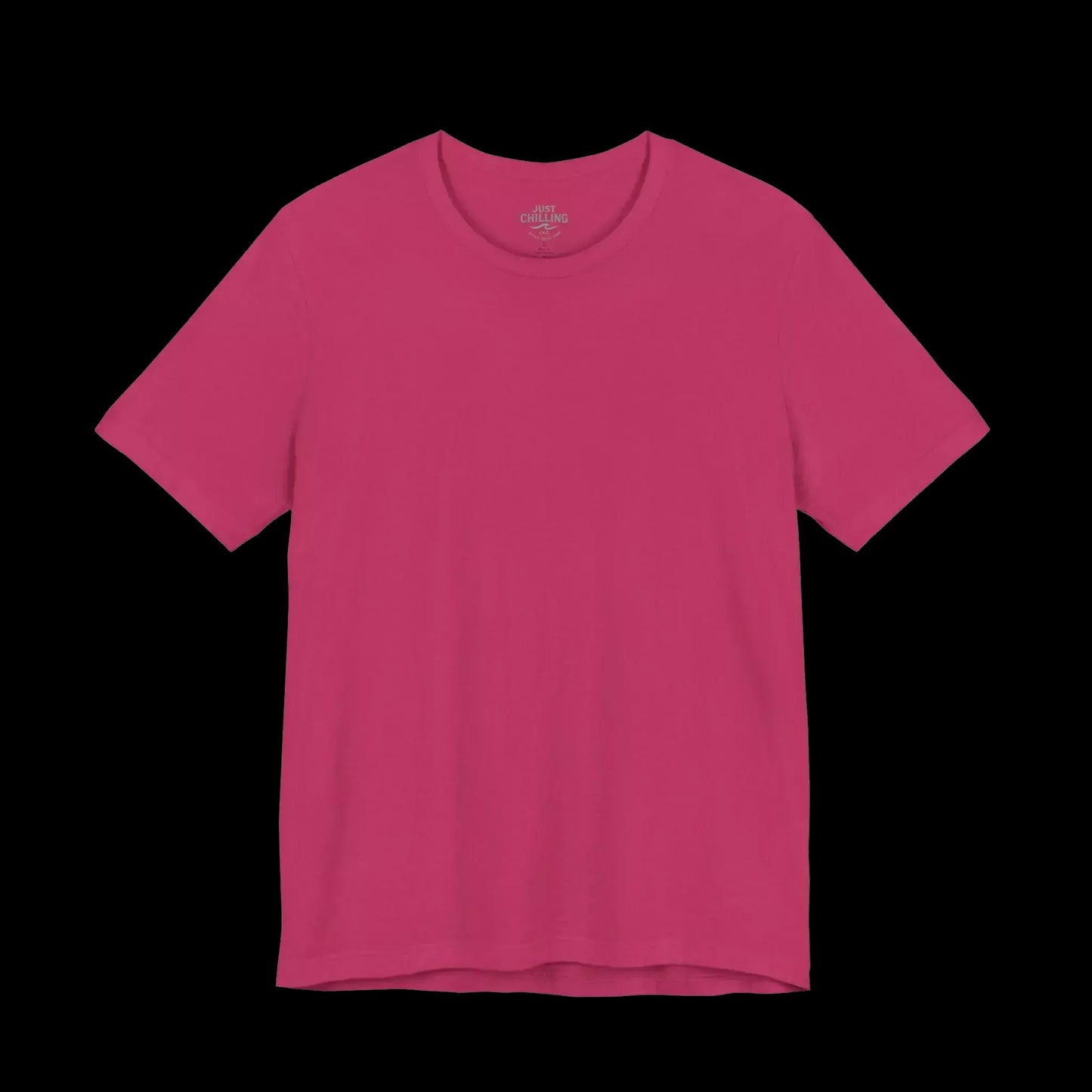 A bright pink t-shirt against a black background.