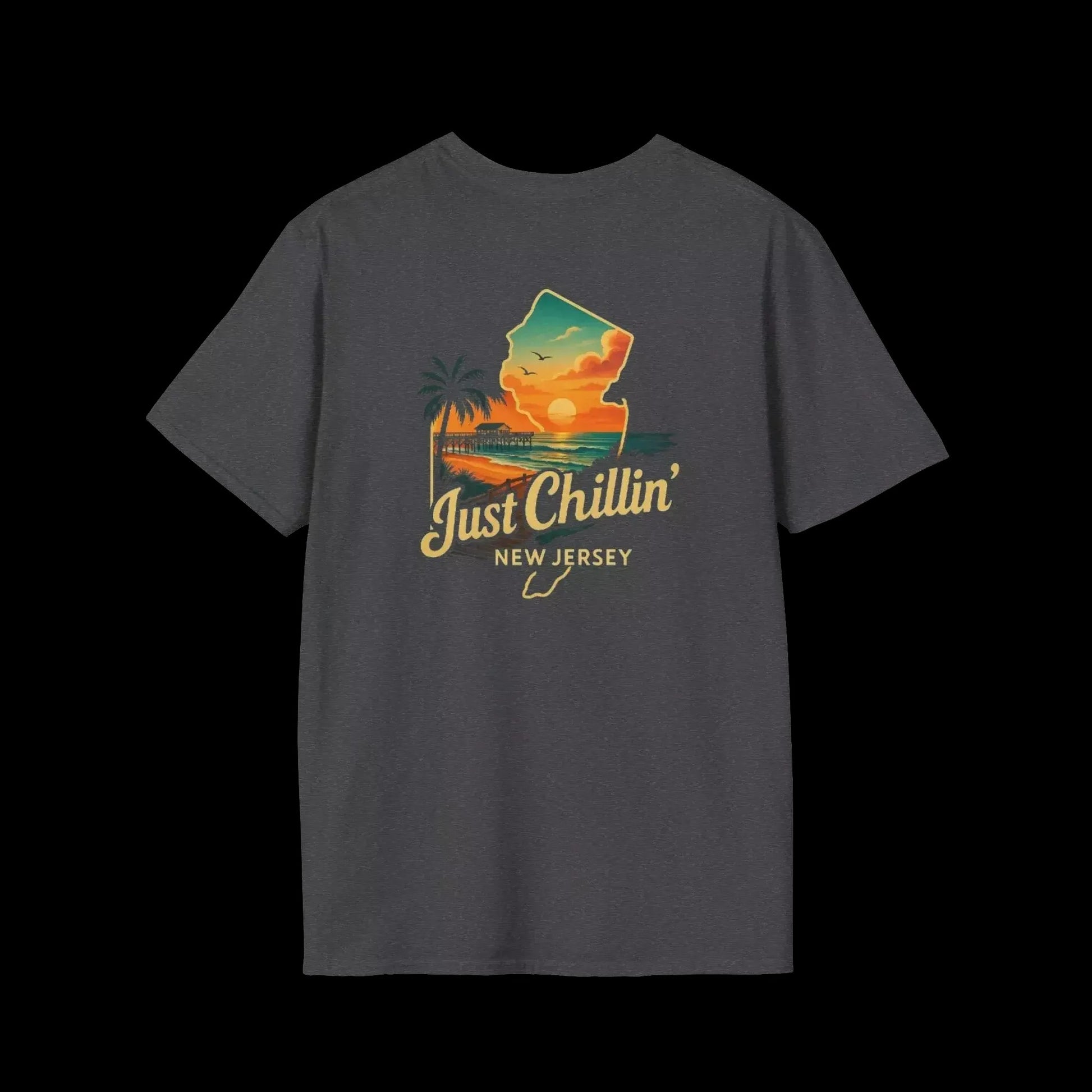 A gray t-shirt with a graphic design depicting a sunset over a beach and palm trees, along with the text "Just Chillin' NEW JERSEY".
