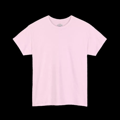 A plain, light pink t-shirt is shown against a black background.