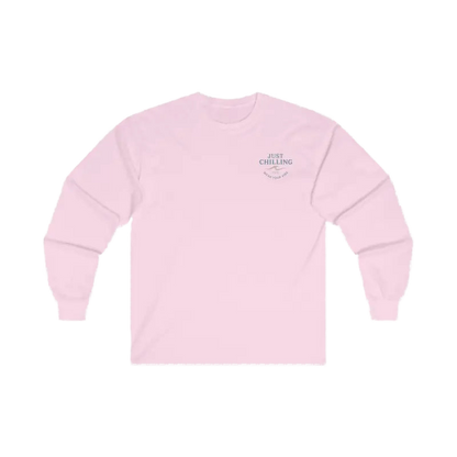 A pink long-sleeved shirt with a small logo on the left side.