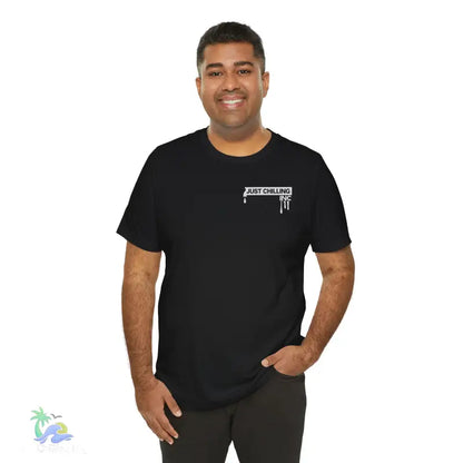Black t-shirt with ’Just Chilling’ graphic.