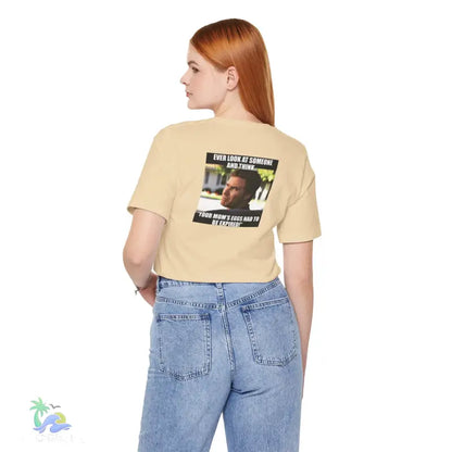 Woman’s graphic tee and jeans.