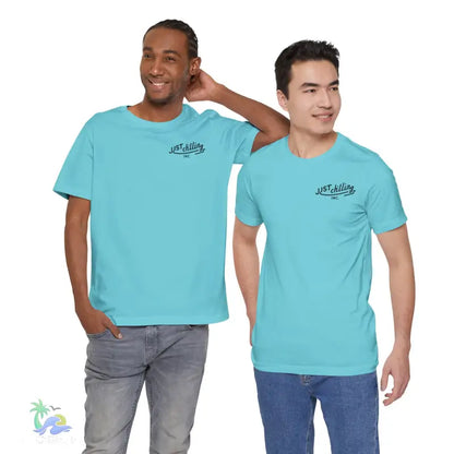 Two men wearing matching turquoise t-shirts.