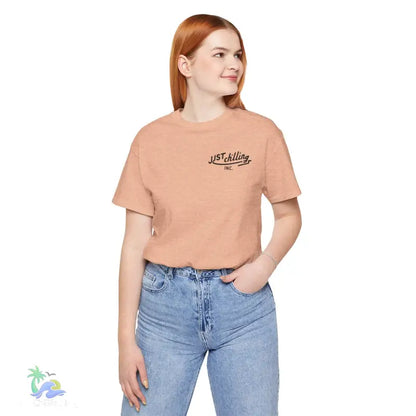 Peach-colored t-shirt.