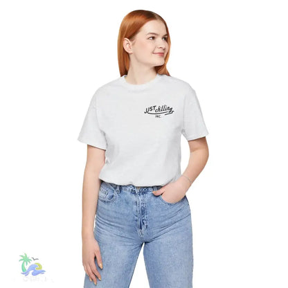 White t-shirt with ’Just Chilling’ text.