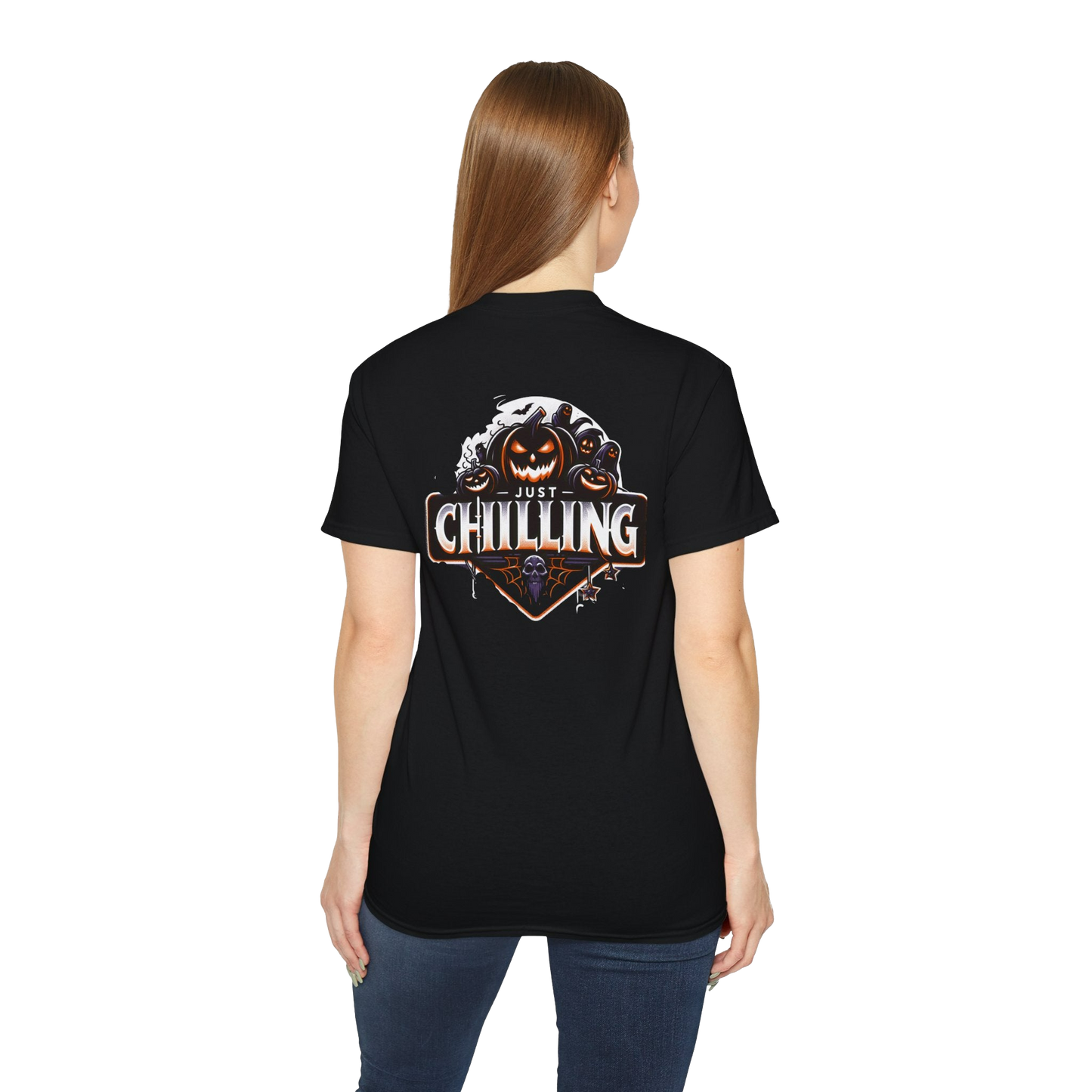 A woman wearing a black t-shirt with a graphic design on the back.